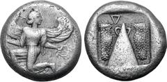 Greek Karia, Kaunos AR Stater. Circa 450-430 BC. Winged Iris in kneeling-running stance to left, head to right, holding [kerykeion] and wreath / Baetyl(?), with "handles" at apex; inverted Δ (K in Car