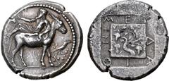 Greek Macedon, Mende AR Tetradrachm. Circa 425 BC. Dionysos, bearded, wearing himation and holding kantharos, reclining to left on the back of a donkey standing to right; before, a crow standing on br