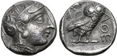 Greek Attica, Athens AR Tetradrachm. Circa 400/390-353 BC. Head of Athena to right, with profile eye, wearing crested Attic helmet ornamented with three olive leaves above visor and spiral palmette on