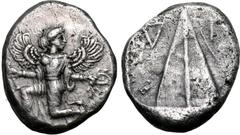 Greek Karia, Kaunos AR Stater. Circa 430-410 BC. Iris running to left, head reverted, holding kerykeion in right hand and wreath in left / Triangular baetyl, inverted Δ and Γ across upper fields; all 