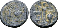 Greek Karia, Tabae Æ 15mm. Pseudo-autonomous issue, circa 3rd century AD(?). TABHNѠN, nude male standing to right, dipping hand into a large basin, column to right / Hermaic statue in centre, flanked 