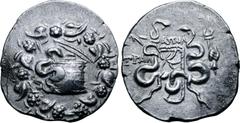 Greek Lydia, Tralleis AR Cistophoric Tetradrachm. Circa 140-135 BC. Apol-, magistrate. Serpent emerging from cista mystica; all within ivy wreath / Two serpents entwined around bow and bowcase; ΑΠΟΛ a