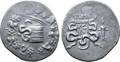 Greek Lydia, Tralleis AR Cistophoric Tetradrachm. Circa 133 BC. Time-, magistrate. Serpent emerging from cista mystica; the whole within wreath / Two serpents entwined around bow and bowcase; TIME abo