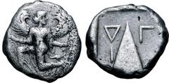 Greek Karia, Kaunos AR Stater. Circa 410-390 BC. Iris running to left, head reverted, holding kerykeion in right hand and wreath in left / Triangular baetyl, inverted Δ and Γ across upper fields, I in
