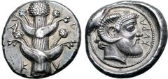 Greek Kyrenaika, Kyrene AR Tetradrachm. Circa 480-460 BC. Silphium plant with two pairs of leaves and five umbels; K-Y-P-A around / Head of Zeus Ammon to right; KYPA before; all within circular border