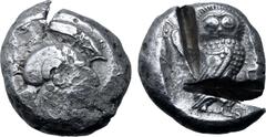 Greek Attica, Athens AR Tetradrachm. Circa 485-480 BC. Archaic head of Athena to right, wearing crested helmet decorated with chevron and dot pattern, and round earring with central boss / Owl standin