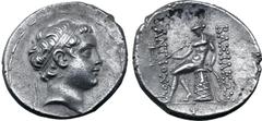 Greek Seleukid Empire, Antiochos (son of Seleukos IV) AR Tetradrachm. Antioch, circa 175 BC. Diademed head to right / Apollo Delphios seated to left on omphalos, holding arrow and resting hand on bow;