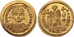 Byzantine Justinian I AV Solidus. Uncertain mint, Carthage or Italy, indiction year 1 = AD 537/8. D N IVSTINIANVS P P AVI, helmeted and cuirassed bust facing, holding globus cruciger and shield decora