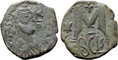 Byzantine Heraclius Æ 40 Nummi. Sicilian mint, struck circa AD 620. Crowned and draped bust of Heraclius facing, monogram to right; all within circular incuse countermark stamped on obverse type of Ju