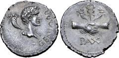 Roman Imperial Civil War, Galba(?) AR Denarius. Uncertain mint in Spain, AD 68. GENIO P. R., bare head of Augustus as the genius of the Roman people to right, cornucopiae over shoulder / PAX, clasped 