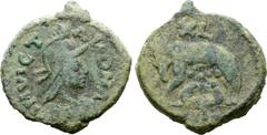 Migration Period Ostrogoths, Municipal Coinage Æ 40 Nummi. Rome, AD 526-534. INVICTA ROMA, draped bust of Roma to right, wearing crested helmet, pendant earring and necklace / She-wolf standing to lef