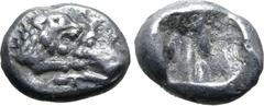 Greek Kingdom of Lydia, Kroisos AR 1/24 Stater. Sardes, circa 561-546 BC. Confronted foreparts of lion to right and bull to left / Incuse punch. GRPC Lydia S10; SNG Tübingen 3652-3. 0.39g, 7mm. Good V