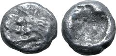 Greek Kingdom of Lydia, Kroisos AR 1/24 Stater. Sardes, circa 561-546 BC. Confronted foreparts of lion to right and bull to left / Incuse punch. GRPC Lydia S10; SNG Tübingen 3652-3. 0.44g, 6mm. Very F