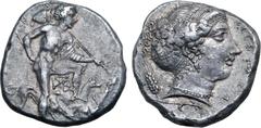 Greek Sicily, Segesta AR Tetradrachm. Circa 405-400 BC. The hunter Aigestes, nude but for chlamys over left arm and pileus hanging from neck, standing to right, left foot propped on rock, holding two 
