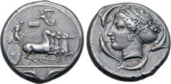 Greek Sicily, Syracuse AR Tetradrachm. Second Democracy, circa 410 BC. Obverse die signed by Euainetos. Charioteer driving fast quadriga to right, holding kentron and reins; above, Nike flying to left