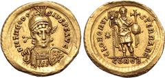 Roman Imperial Theodosius I AV Solidus. Constantinople, AD 425-430. D N THEODOSIVS P F AVG, pearl-diademed, helmeted and cuirassed bust facing, holding spear and shield with horseman motif / GLOR ORVI