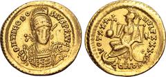 Maritime Theodosius II AV Solidus. Constantinople, AD 430-440. D N THEODOSIVS P F AVG, pearl-diademed, helmeted, draped and cuirassed bust facing slightly to right, holding spear and shield decorated 