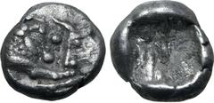 Greek Kingdom of Lydia, Kroisos AR 1/24 Stater. Sardes, circa 561-546 BC. Confronted foreparts of lion to right and bull to left / Incuse punch. GRPC Lydia S10; SNG Tübingen 3652-3. 0.43g, 7mm. Good V