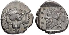 COINS OF THE GREEK WORLD LYCIA. Mithrapata, c. 390-370. Stater c. 380. Obv. Facing lion scalp; triskeles below. Rev. Head of Mithrapata to. l., MITHRAPATA (in Lycian) around, triskeles to lower r.; al