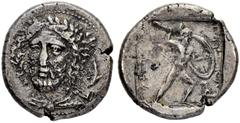COINS OF THE GREEK WORLD LYCIA. Perikles, 380-360. Stater 380/375, Phellos. Obv. Head of Perikles facing slightly to l., wearing laurel wreath, on right, dolphin downwards. Rev. Warrior, naked but for