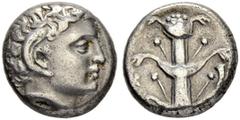 COINS OF THE GREEK WORLD CYRENAICA. Cyrene. Didrachm 3rd century. Obv. Head of young Apollo Carneios with ram's horn to r. Rev. Silphium plant. Cornucopia on r. 7.56 g. BMC 230-231. SNG Cop. 1234. Tig