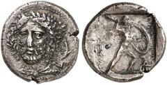 COINS OF THE GREEK WORLD. LYCIA. Phaselis. Perikles, 380-360. Stater 380/375 BC, Phellos. Head of Perikles facing slightly to left, wearing laurel wreath, on right, dolphin downwards. Rv. Warrior, nak