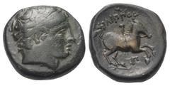 Greek Königreich Makedonien. Philippos II. (359 - 336 v. Chr.). Bronze. Ca. 359 - 336 v. Chr. Vs: Kopf des Apollon mit Tainia rechts. Rs: Jugendlicher Reiter nach rechts galoppierend, zwischen den Bei
