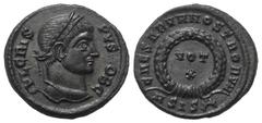 Roman Imperial Coinage Crispus (Caesar 317 - 326 n. Chr.). Follis (Bronze). 321 - 324 n. Chr. Siscia. Vs: IVL CRISPVS NOB C. Kopf mit Lorbeerkranz rechts. Rs: CAESARVM NOSTRORVM / ASIS Halbkranz. VOT 