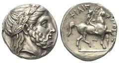 Griechische Münzen Königreich Makedonien. Philippos II. (359 - 336 v. Chr.). Tetradrachme (Silber). Ca. 359 - 336 v. Chr. Vs: Kopf des Zeus mit Lorbeerkranz rechts. Rs: Reiter mit Petasos und Chlamys 
