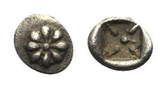 KLEINASIEN. Ungesicherte Münzstätte. Tetartemorion. 5. Jhdt. v. Chr. Vs: Rosette. Rs: Vierstrahliger Stern in Quadratum incusum. In den Standardzitierwerken unpubliziert. Fast vorzüglich. Selten. 0,11