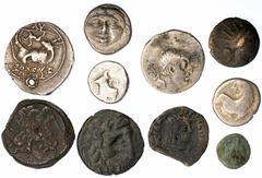 Ancient Greece and the Hellenistic World a Selection of Greek Small Coinage (10): i) Caria, Rhodes, AE 9, 1.06g; ii) Caria, Rhodes, AE 14, c. 166-88 BC, head of Helios, rev. rose in square, 1.46g; iii