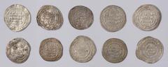 Islamic Coins Abbasid, al-Qahir (320-322h), silver dirhams (4): Madinat al-Salam, 321h; Shiraz, 322h; and "avenger" type dirham, Madinat al-Salam, 322h; Wasit, 322h; al-Radi (322-329h), silver dirhams