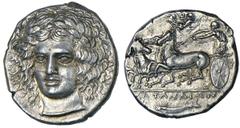 KATANA. Ca.410 B.C. Tetradrachm. Facing head of Apollo, turned slightly to l., engraver's signature [H]PAKΛEIΔ[AΣ] to r. Rv. Quadriga l. driven by auriga, Nike above flying toward him holding wreath, 