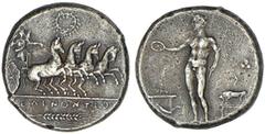 SELINOS. 417-409 B.C. Tetradrachm. Galloping quadriga driven r. by Nike, wreath above, [Σ]EΛINONTIO[N] below, ear of grain in ex. Rv. River-god Selinos standing l. pouring libation over altar before w