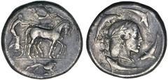 SYRACUSE. End of the Deinomenid Tyranny, beginning of the Second Democracy. Ca.466-5 B.C. Dekadrachm (Demareteion). Slow quadriga driven r. by male charioteer holding goad, Nike above flying r. crowni