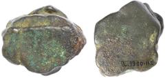 AES RUDE. 5th-4th Century B.C. Irregular lump of bronze (88.36 grams), approximately 35mm x 30mm x 17mm thick, with two flat surfaces. Cf. T-V p.15 and pl.2. Marked in ink with an identification numbe